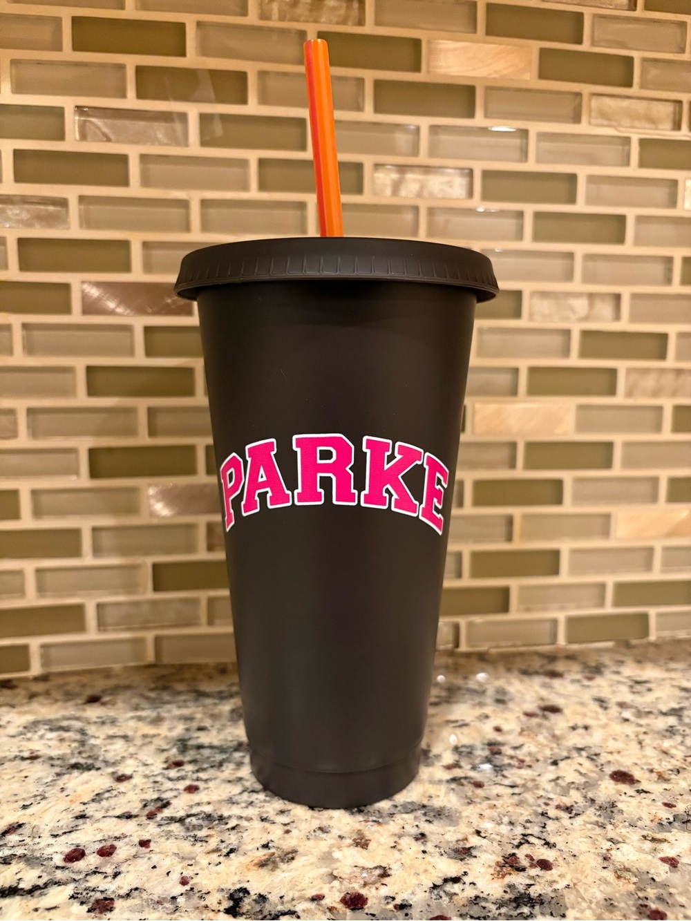 Parker Black Tumbler with Pink Logo and Orange Straw